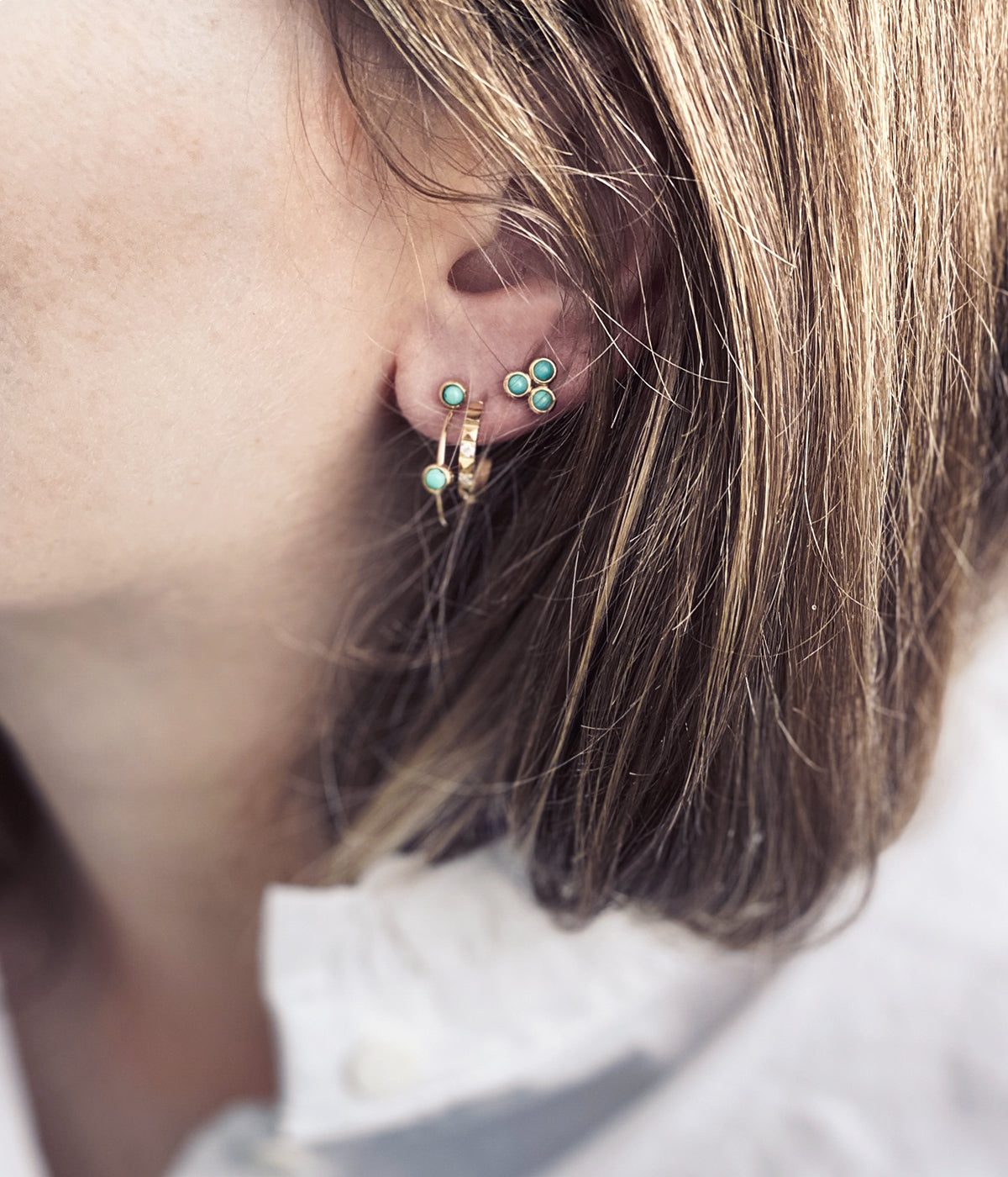 Boucles d'oreilles puces Tiradente (Acier doré)